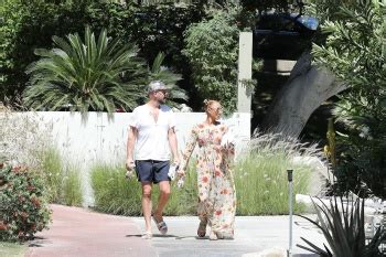 Swimwear Melanie Brown Sunbathing Topless In A Bikini At A Resort In Desert Springs Ca