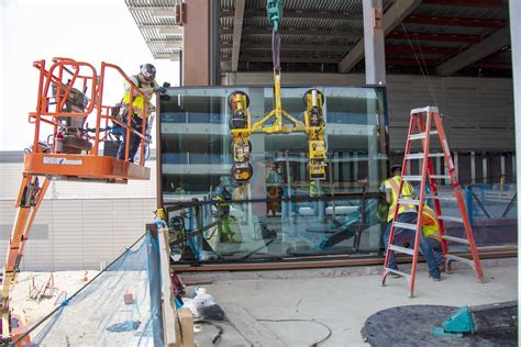 Glass Installation Takes Shape Build KCI