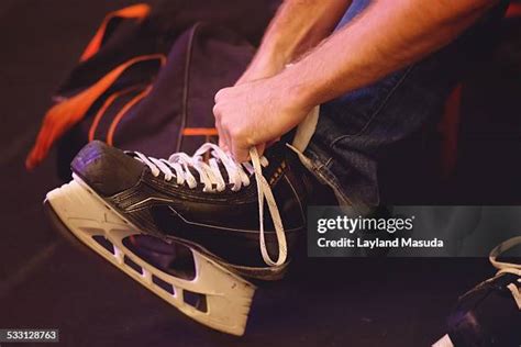 Tying Hockey Skates Photos And Premium High Res Pictures Getty Images