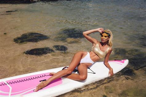 Woman With Blond Hair In Bikini And Sunglasses Relaxing On Beach Stock Photo Image Of Model