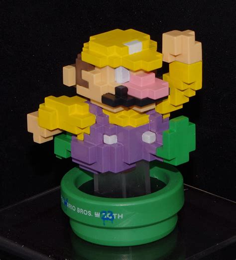 Update: Also Waluigi - Fan gives 8-bit Mario amiibo the Wario treatment ...