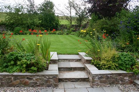 Indian sandstone garden steps in a Scottish Borders farmhouse garden. Goose Green Design ...