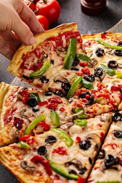 Premium Photo Vegetarian Pizza With Peppers Mushrooms And Olives