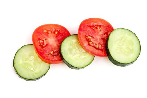 Tomato And Cucumber Slice Isolated On White Background Top View Stock