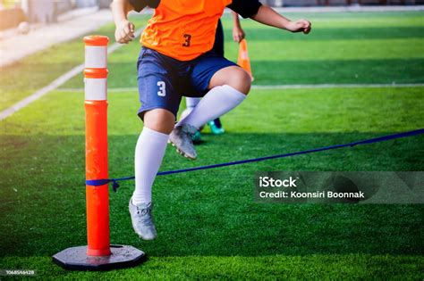 Boy Soccer Player Perform Coordination And Strength Drills By Jumping