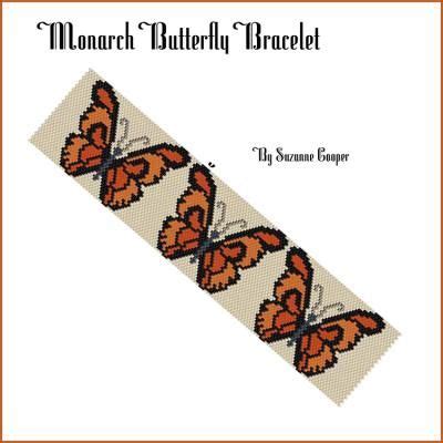 A Cross Stitch Bookmark With An Orange Butterfly On The Front And Back