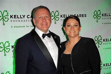 Who is Brian Kelly's wife, Paqui Kelly?