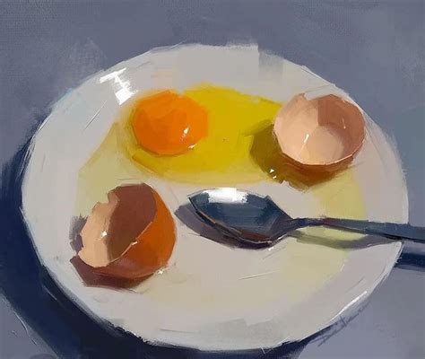 An Egg And Two Eggs On A White Plate With A Silver Spoon Next To It