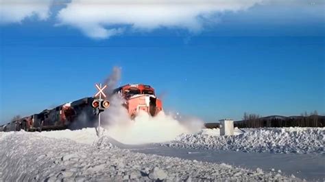 Awesome Powerful Trains Plow Through Snowy Railway Tracks