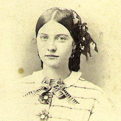 Lovely head piece- with flowers and ribbon. Nice rosettes on her ...