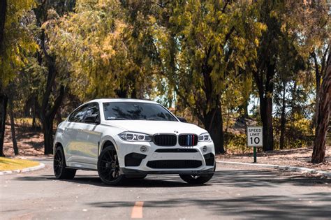 A 2018 BMW X6M on 22 Inch Blaque Diamond BD-F18 Gloss Black Wheels ...