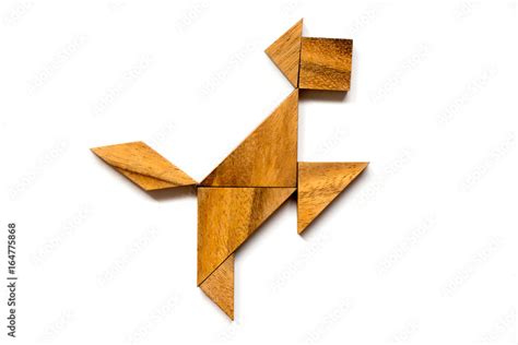 Wooden tangram puzzle in happy dog shape on white background Stock ...