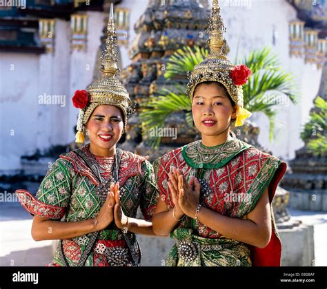 Temple Dancers At Wat Pho Displaying The Wai A Thai Gesture Of