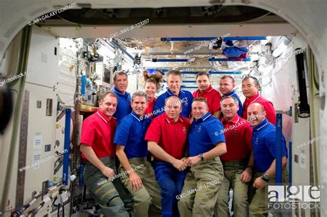 Sts Blue Shirts And Expedition Crew Members Pose For A Group