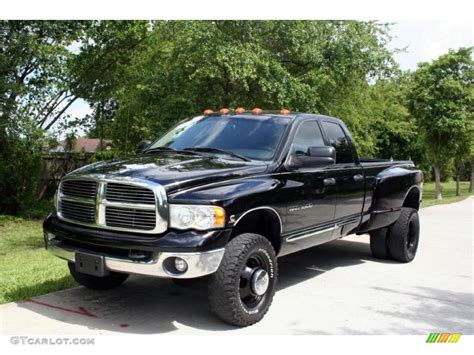 2005 Black Dodge Ram 3500 Laramie Quad Cab 4x4 Dually 31426204 Photo