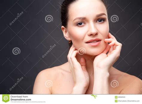 Close Up Portrait Of Elegant Brunette Woman With Nude Make Up Stock