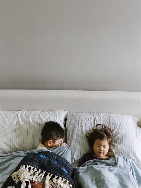 Kids Pretending To Sleep By Stocksy Contributor Lauren Lee Stocksy