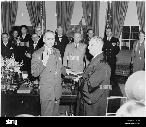 Photograph of Dean Acheson taking the oath of office as Secretary of State, with Chief Justice ...