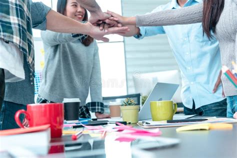 Group Of Diversity People Fist Bump Holding Hands Together Power Of Tag