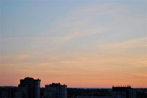 A Panoramic View of the Sunset Sky Over the City Rooftops Stock Image ...