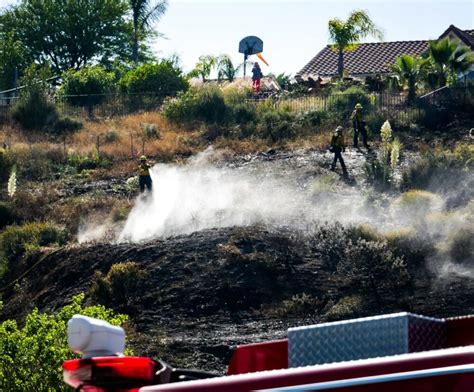 Fire Scorches Hillside Near Homes