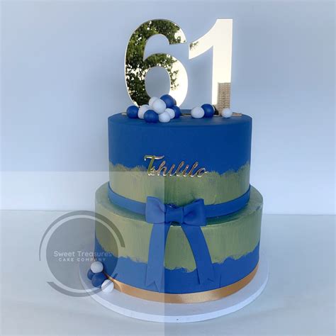 Blue and gold birthday cake