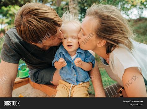 Happy Parents Kissing Image & Photo (Free Trial) | Bigstock