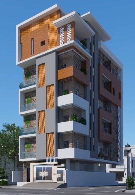 An Apartment Building With Balconies And Plants On The Top Floor Is