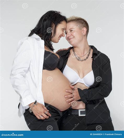 Two Lesbian Women Walking Down The Street Holding Hands Royalty Free Stock Photography