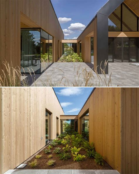 A House Designed Like Two Barns Beside Each Other | ArchUp