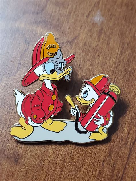 Disney Firefighters Donald Duck Nephew Fire Extinguisher Pin For Sale