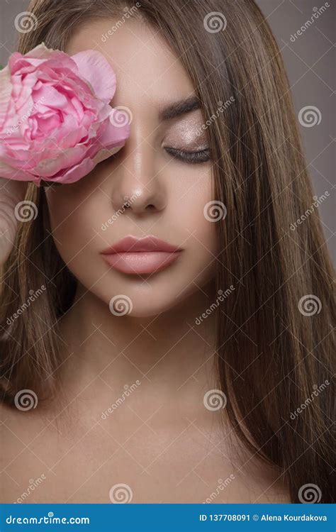 Portrait Of Beautiful Woman Shiny Straight Hair And Closed Eyes Flower