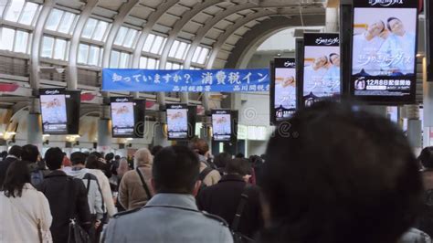 Large Crowd Group Of Asian People Walk At Shinagawa Subway Train