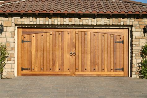 Single Doyle Custom Wood Garage Door with Arch | Garage Doors and Gates