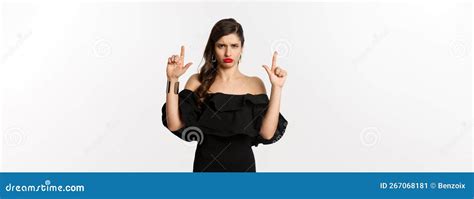 Fashion And Beauty Disappointed Woman Sulking Upset Pointing Fingers