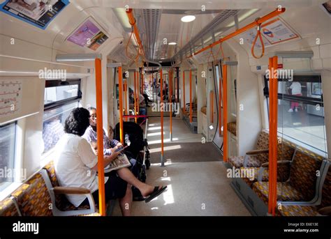 London Underground train interior with passengers Stock Photo - Alamy