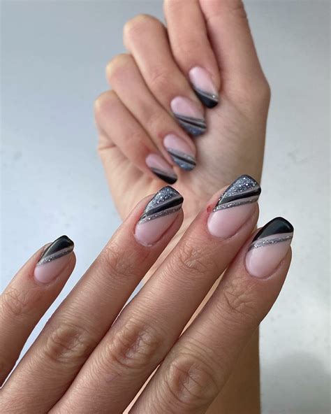 Dazzling Black And Silver Nails For A Sophisticated Edge Nail