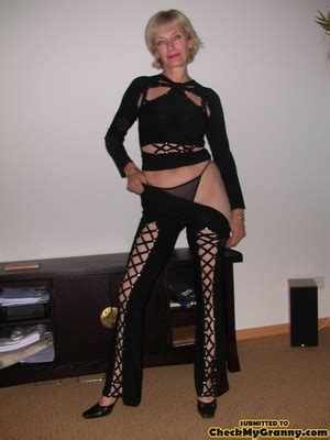 Blonde Mature Stunner Teasingly Changing He XXX Dessert Picture