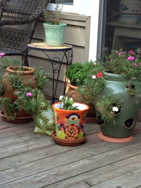 Deck Pots | Pots with Flowers and Plants Sitting on the Porch