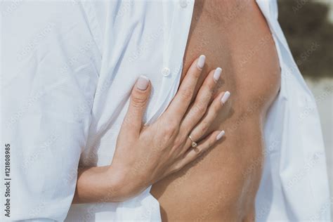 Sexy Muscular Naked Man And Female Hands Unbuckle His Jeans Stock Photo Adobe Stock