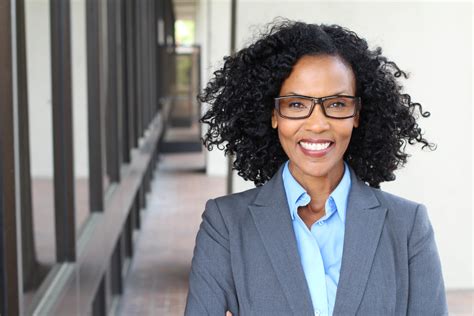 African American business woman wearing glasses - IBTS