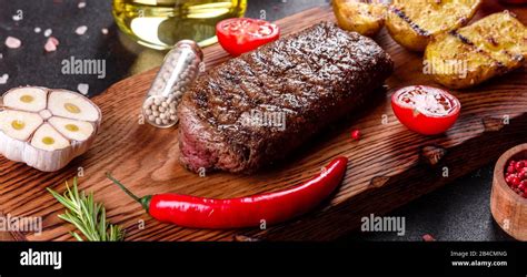 Ribeye Steak With Potatoes Onions And Cherry Tomatoes Juicy Steak