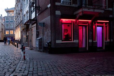 Red Light Districts Of Brussels And Amsterdam