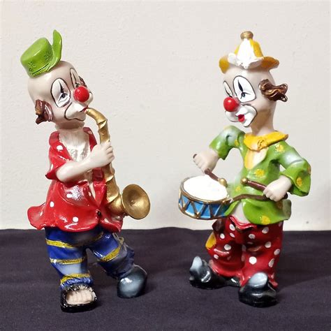 Vintage Clown Musicians One Clown Playing Saxophone And One Clown