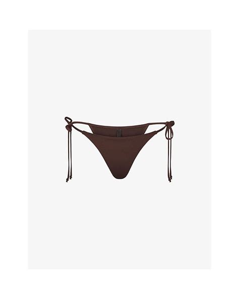 Skims Mid Rise Recycled Stretch Nylon Bikini Bottoms Xx In Brown Lyst