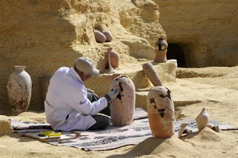 Egypt unveils tombs and sarcophagus in new excavation