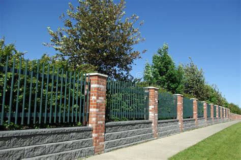 Brick And Iron Fence Stock Image Image Of Perspective 22338491