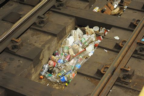 Removing subway trash cans has resulted in more track fires, litter