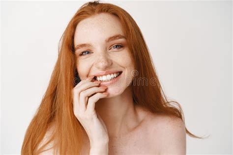 Close Up Of Young Redhead Woman Looking Left Turn Head At Promo Banner Standing Naked On White