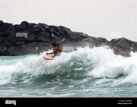 Surfing The Waves In Mirissa Sri Lanka Stock Photo Alamy